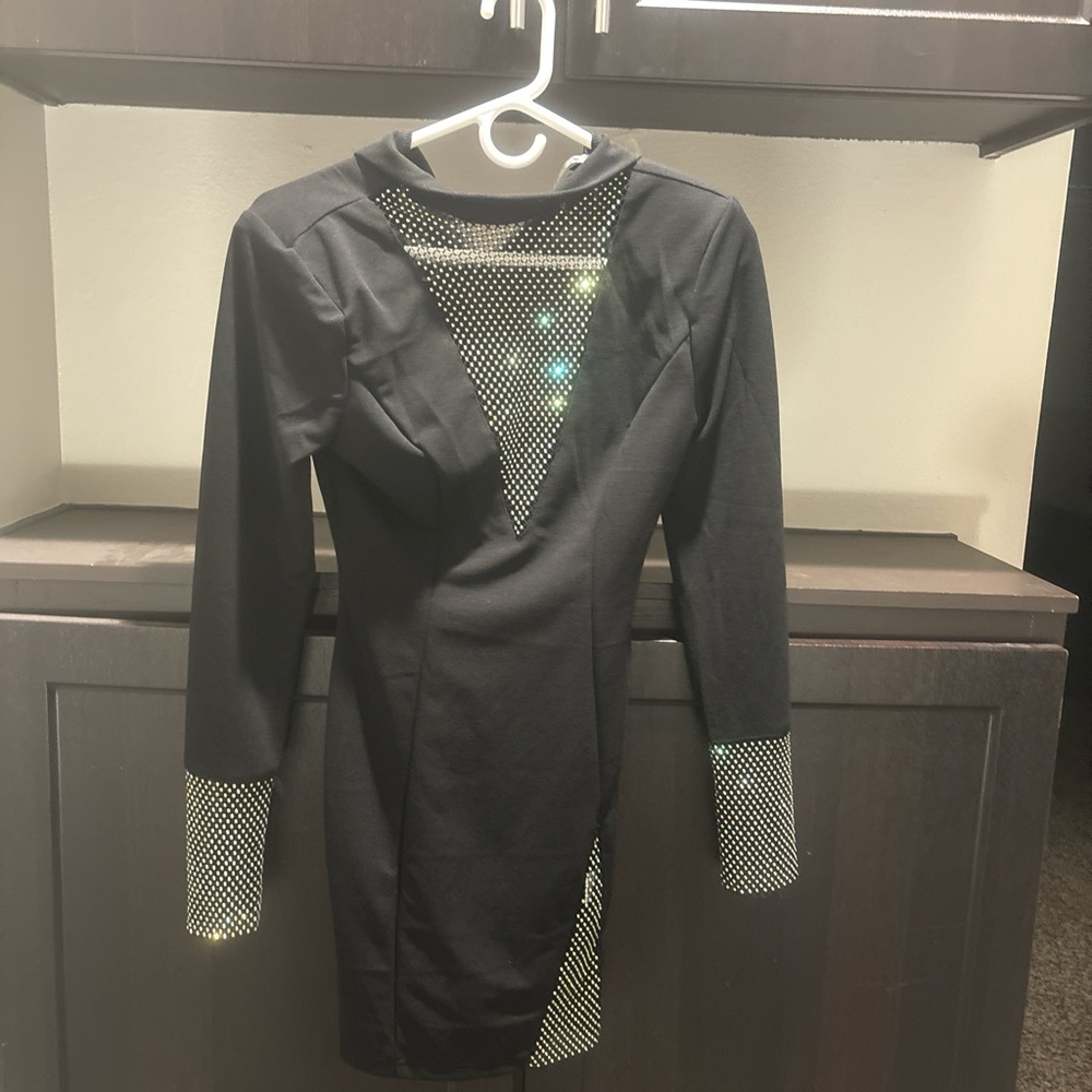 Dress 
By Modern mb 
Size small.  
Color black with dimond design.